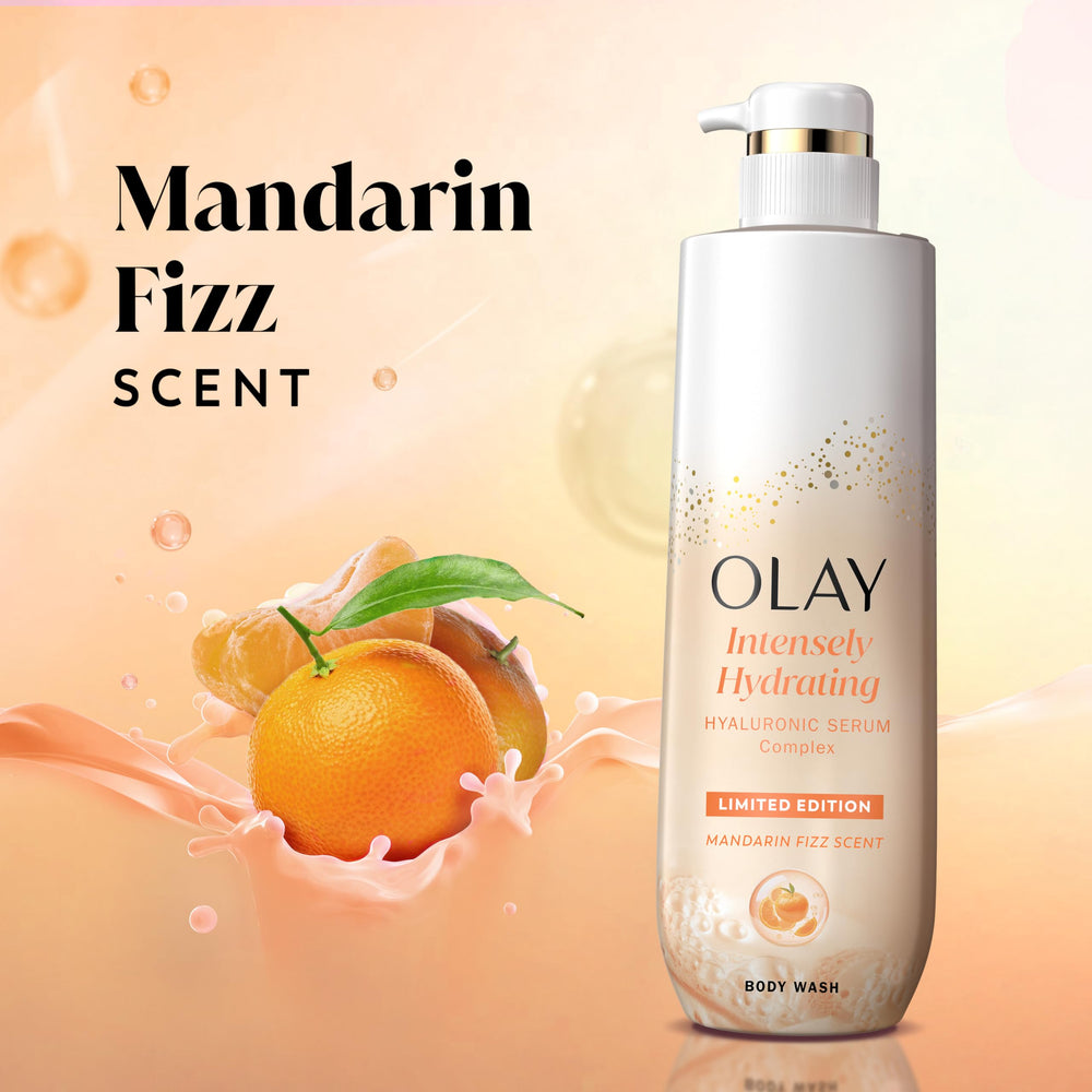 Olay Mandarin Fizz foam close-up demonstrates luxurious cleansing texture.