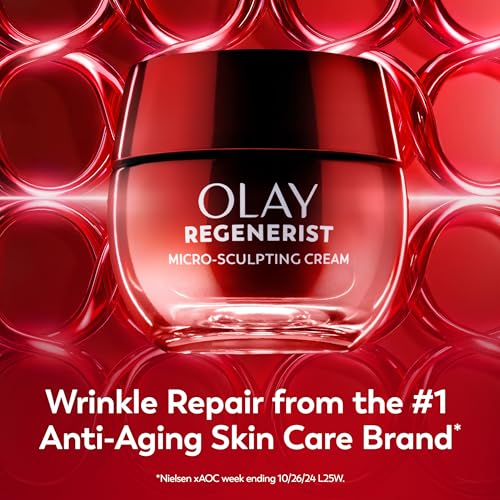 Olay Regenerist cream being smoothed onto skin.
