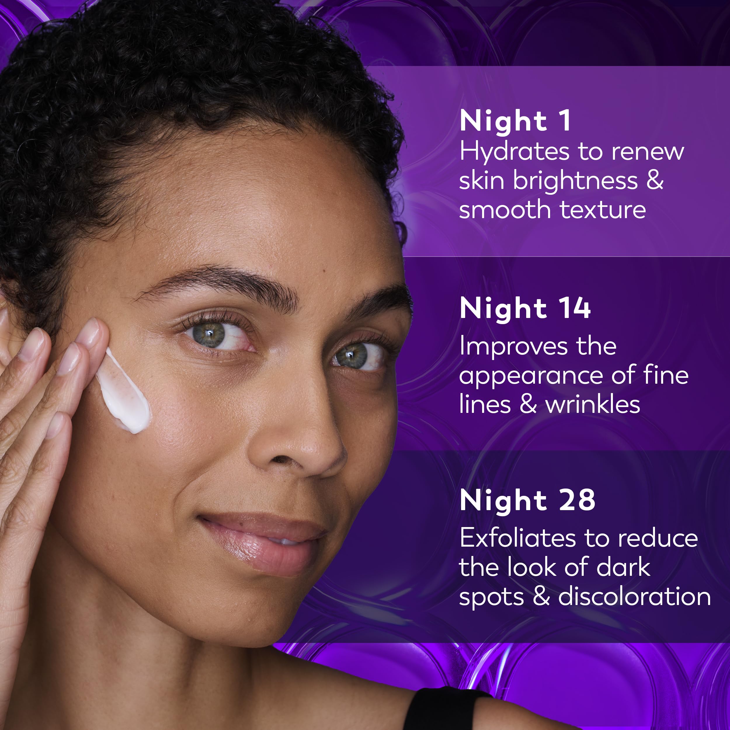 Creamy texture swirl of Olay Regenerist night cream on skin