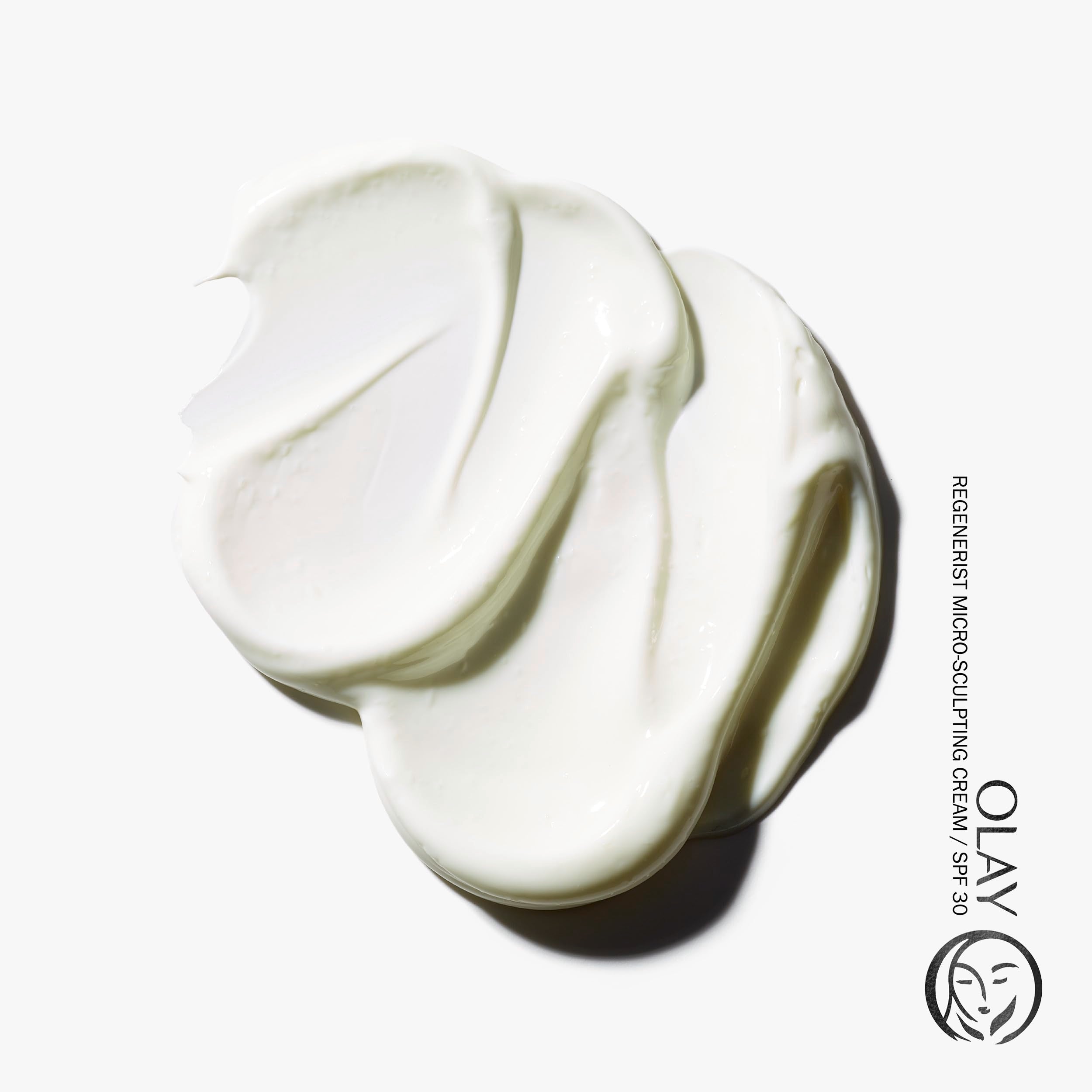 Olay Regenerist SPF 30 cream on hand demonstrates lightweight texture for quick absorption.