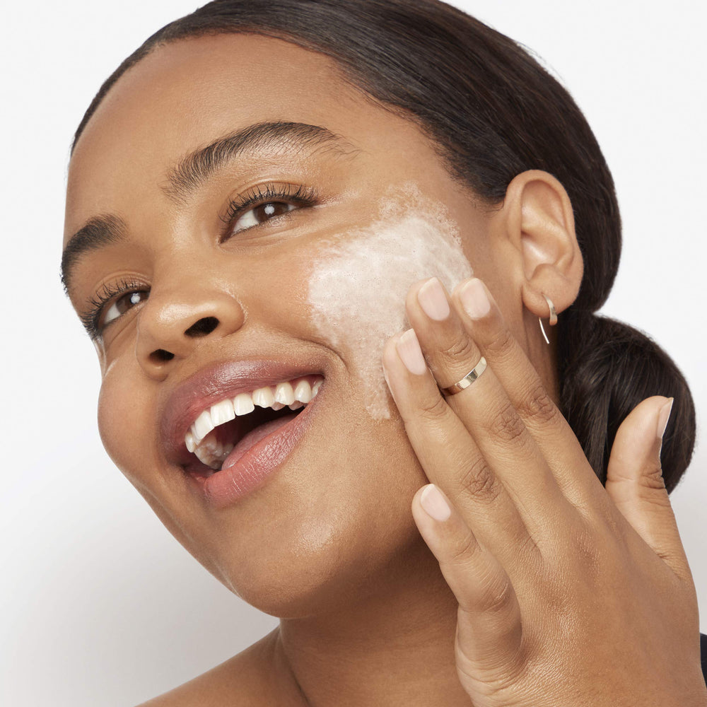 Olay Total Effects refreshing citrus scrub foamy lather shown for quick cleanse