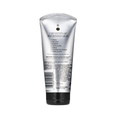 Olay Total Effects refreshing citrus scrub label close-up with citrus-infused formula for refreshing cleanse