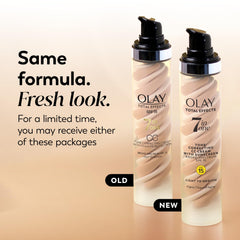 Olay SPF15 cream application shows quick absorption without greasiness.