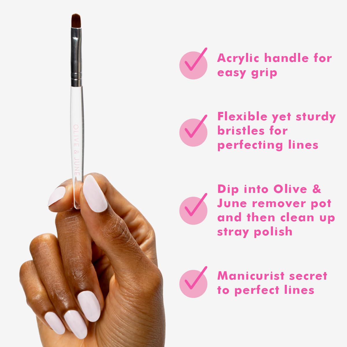 Olive & June Clean Up Brush easy-grip handle provides controlled cleanup.
