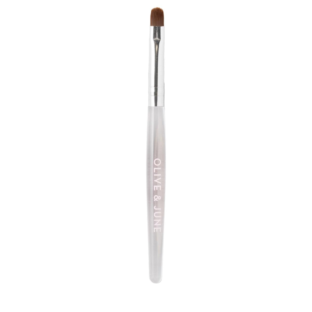 Olive & June Clean Up Brush with rounded tip for precise clean-up of nail edges.