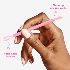 Olive & June rounded flat-end pusher for gentle cuticle pushing at home.
