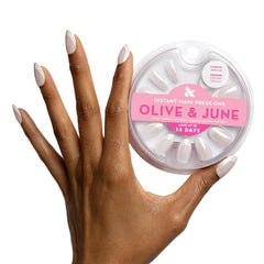Olive & June Instant Mani nails packaging with kit contents for at-home results