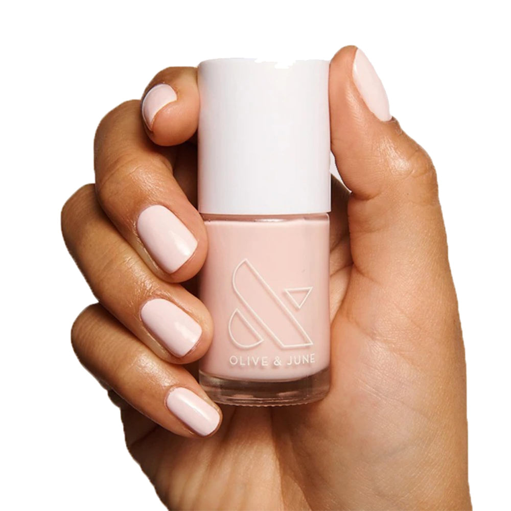 Olive & June Baby Pink bottle showing spring shade for salon-quality color.