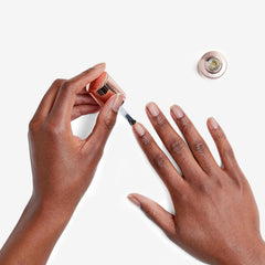 Olive & June Nail Primer brush-application for a smooth coat