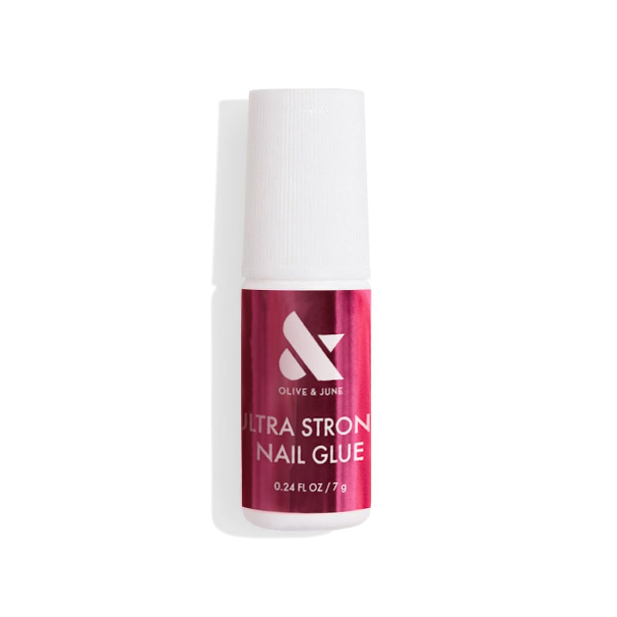 Olive & June Ultra Strong Nail Glue with brush-on applicator for even coverage.
