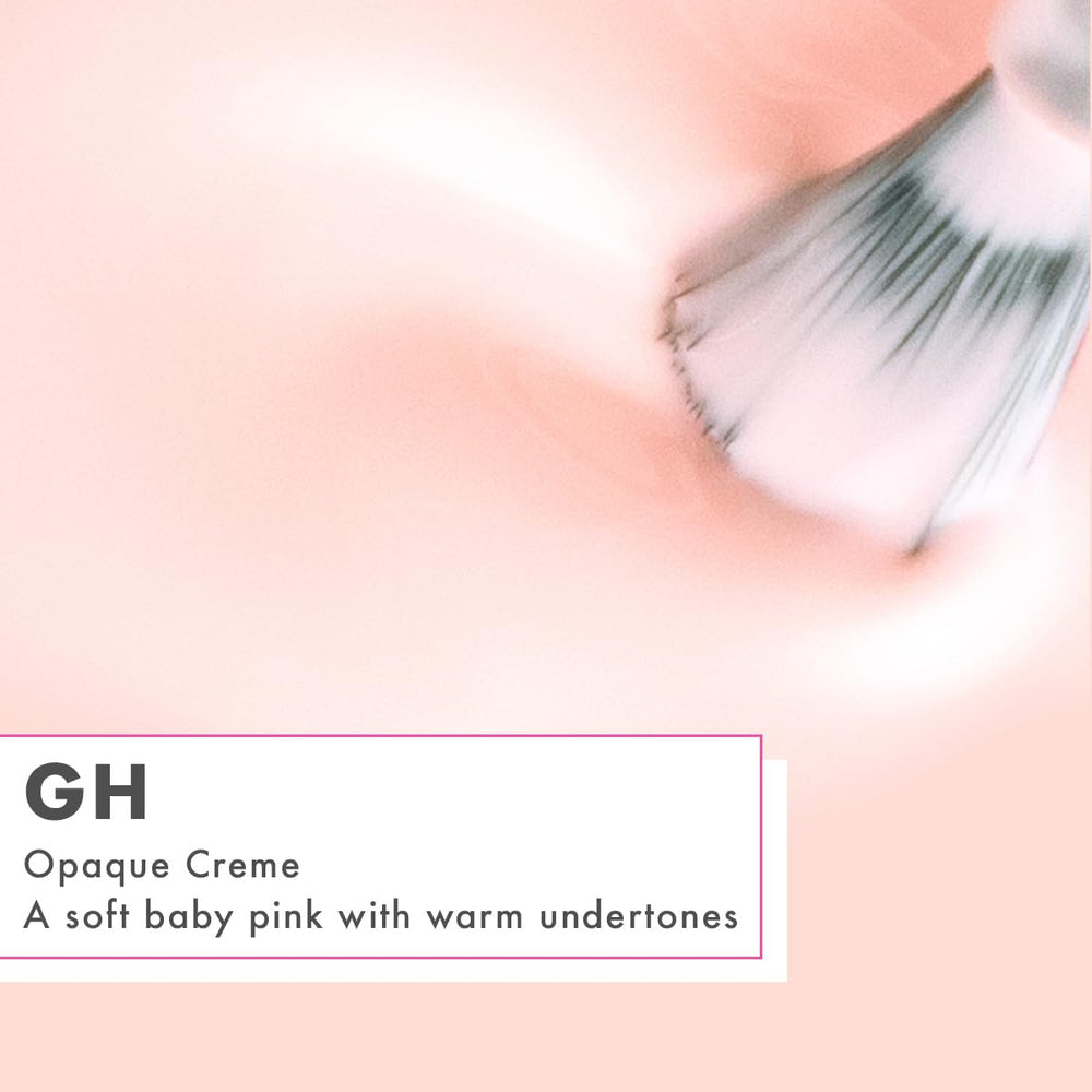 Olive & June wide fan brush applying polish for precise results.