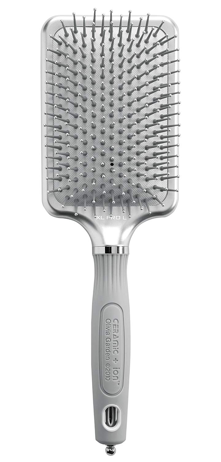 Olivia Garden Ceramic + Ion XL Pro brush with a large silver paddle for smooth, shiny hair.
