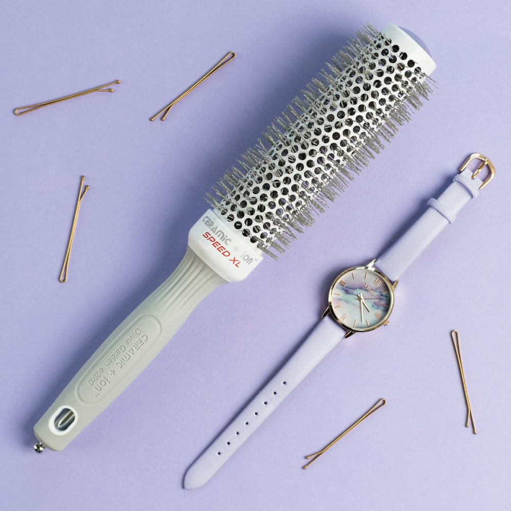 The 1 3/8 inch barrel supports voluminous blowouts on longer hair.