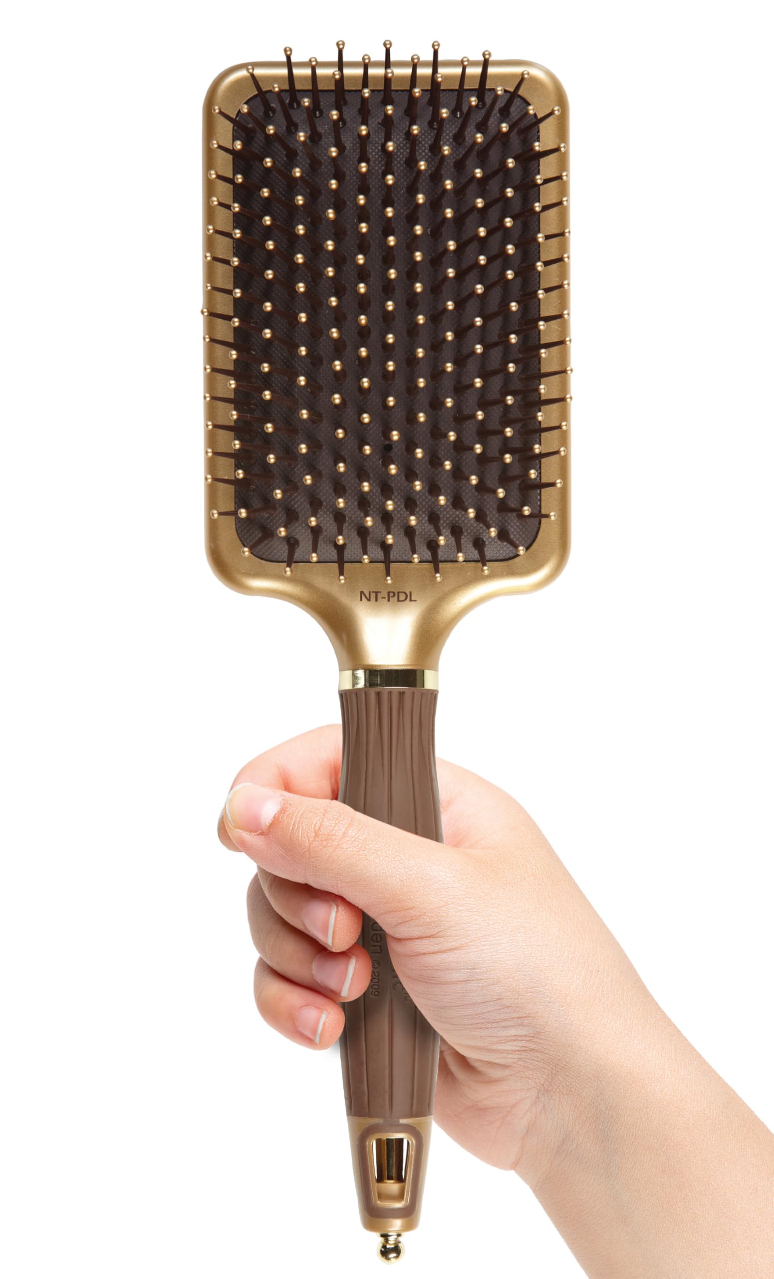 Olivia Garden NanoThermic Paddle Brush uses ion technology to boost shine