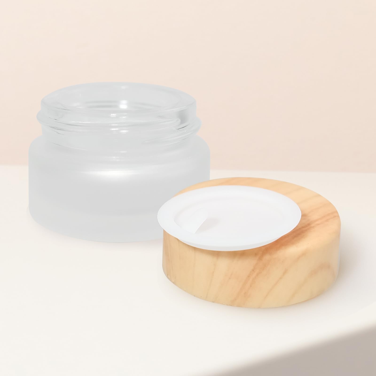 Olutacot frosted mini glass sample containers ideal for precise skincare or makeup miniatures.