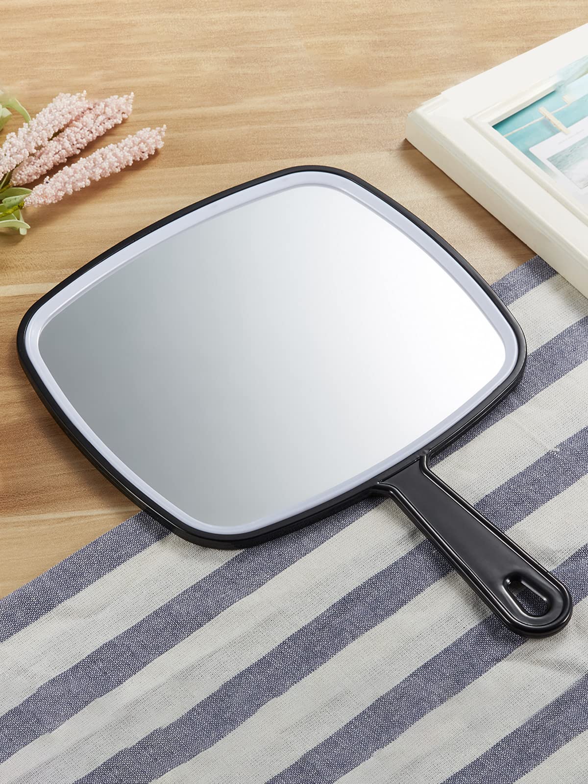 OMIRO black rounded-rectangle style complements any bathroom.