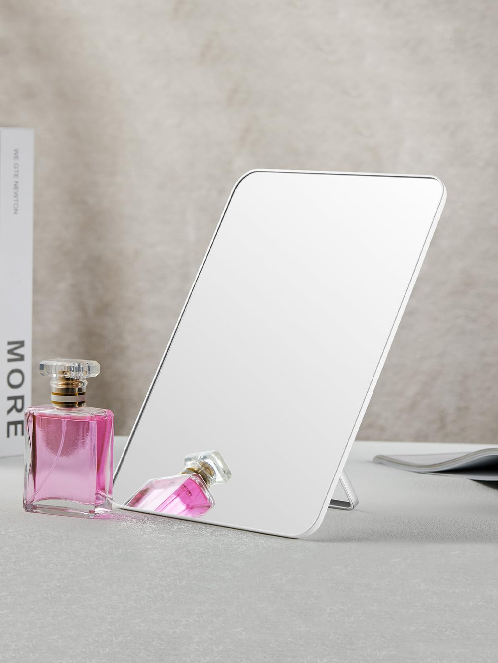 OMIRO office desk setup with large tabletop reflection