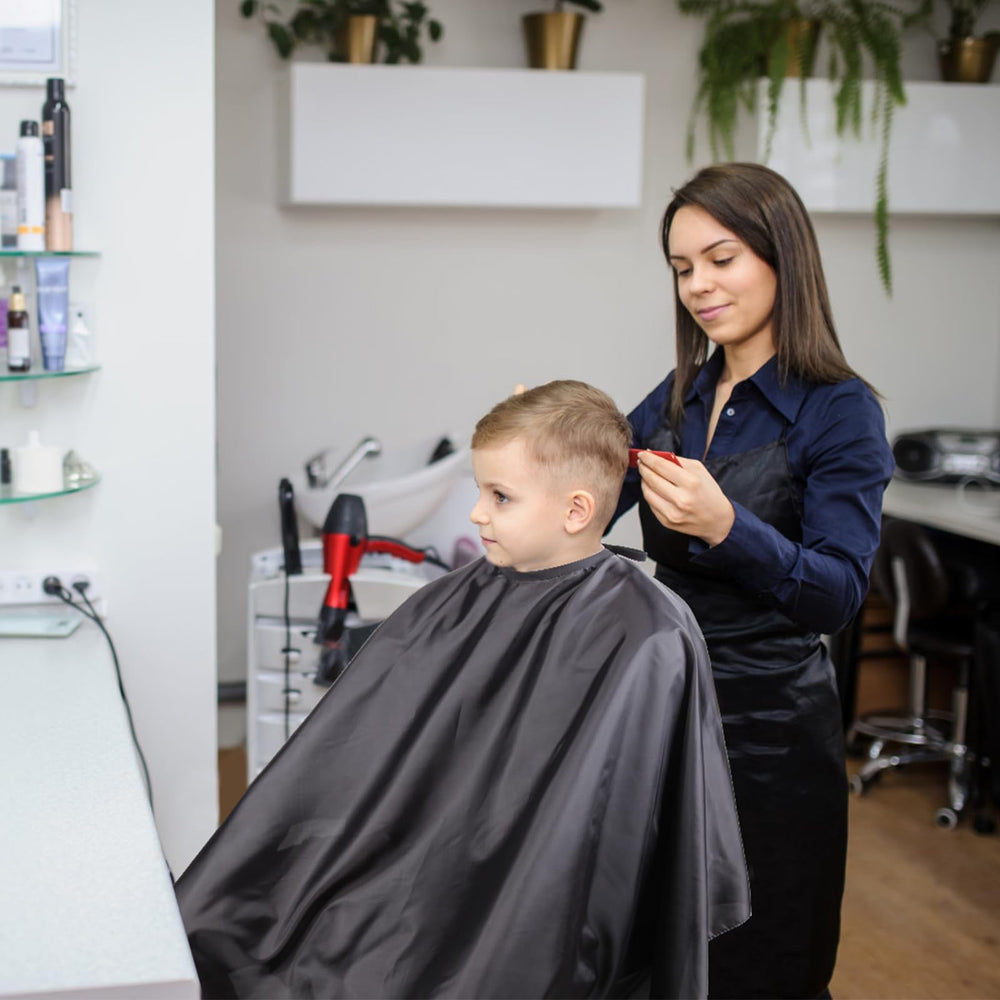 Omvoina durable black cape offers professional coverage and longevity.