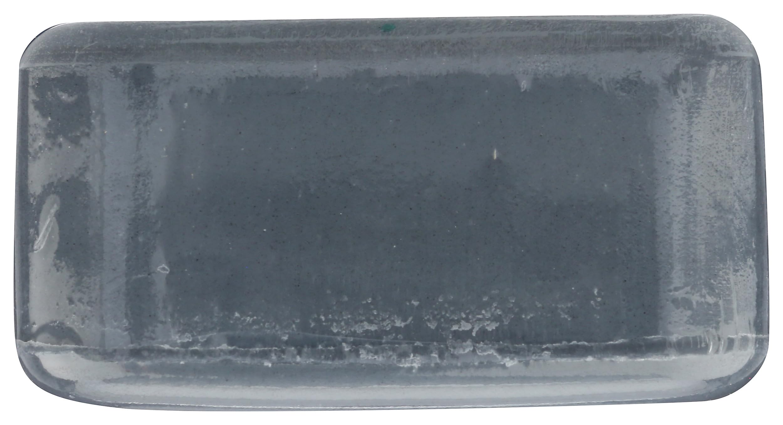 One With Nature charcoal soap in hand for travel-friendly use