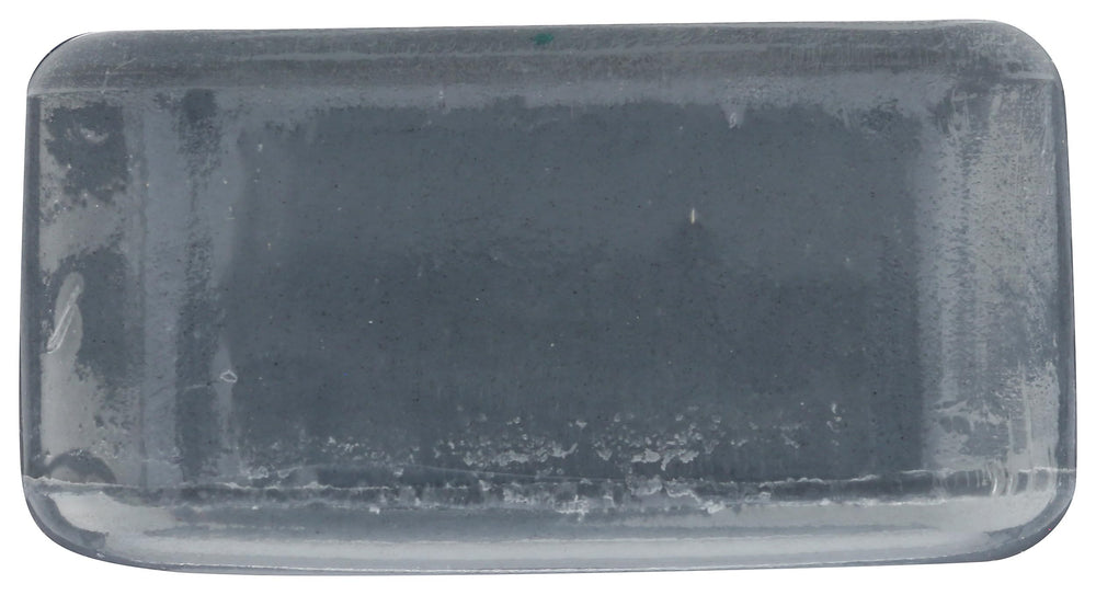 One With Nature charcoal soap in hand for travel-friendly use