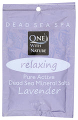 One With Nature Dead Sea salts in lavender bath tub for relaxing bath and skin balance.