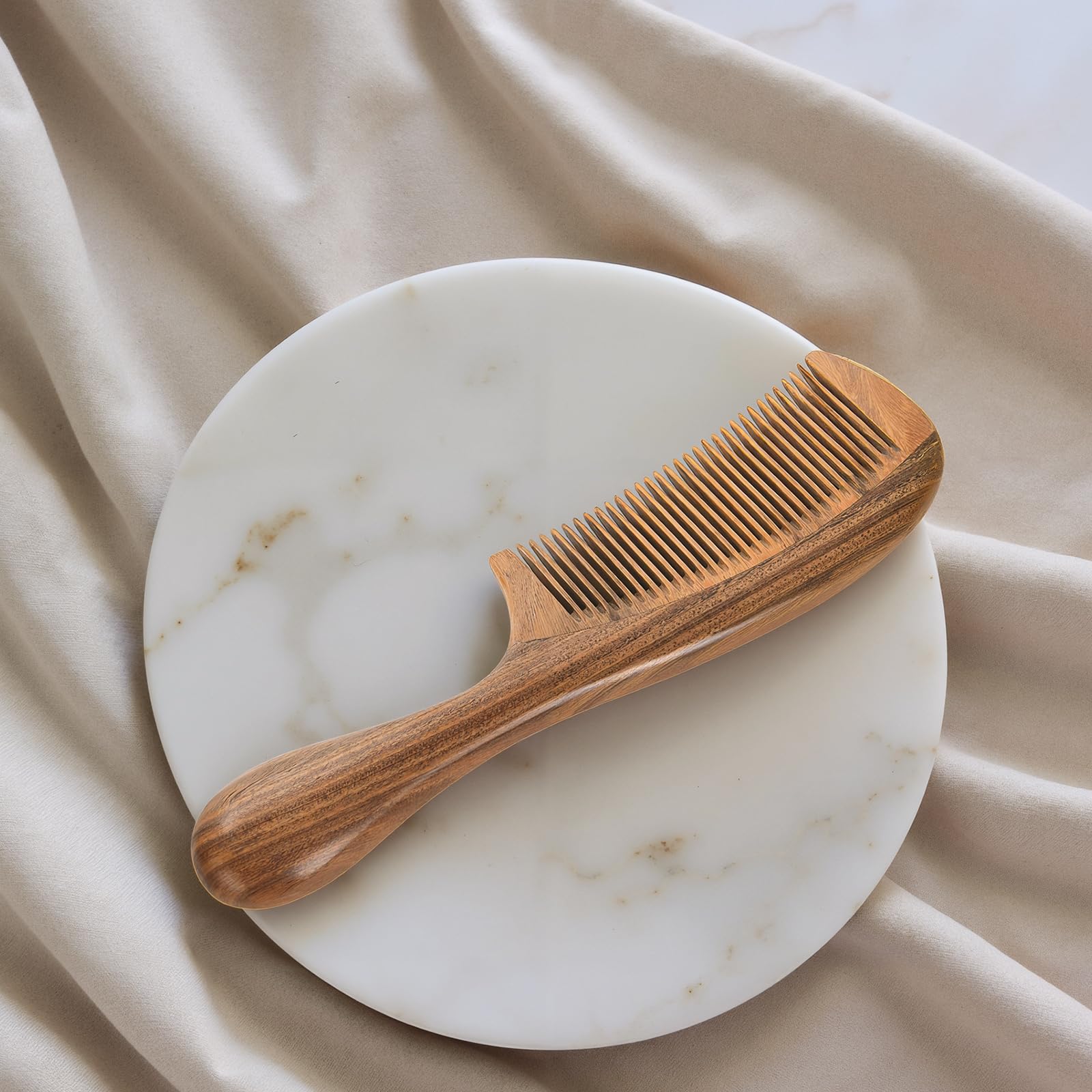 Onedor handcrafted sandalwood detail highlights natural grain and craftsmanship.