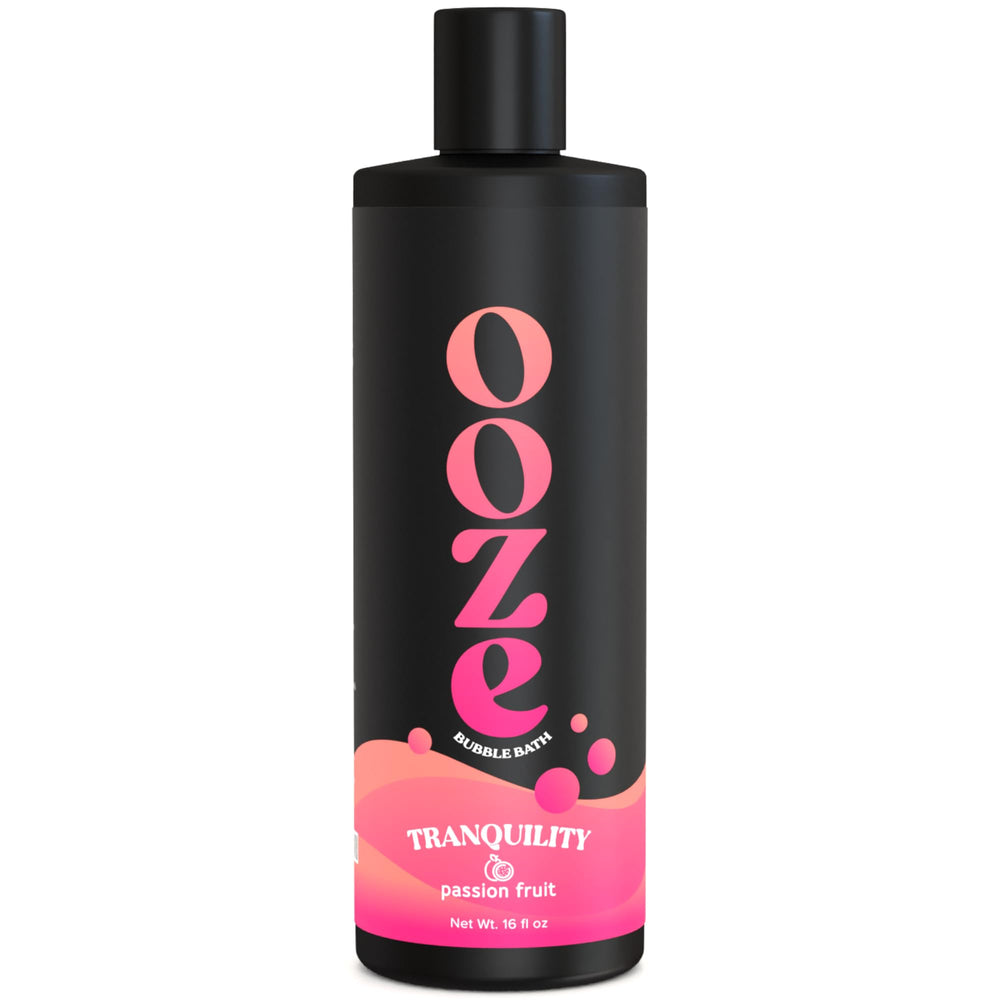 OOZE Baño de Burbujas de Fruta de la Pasión, botella vertiéndose, relajación aromática.