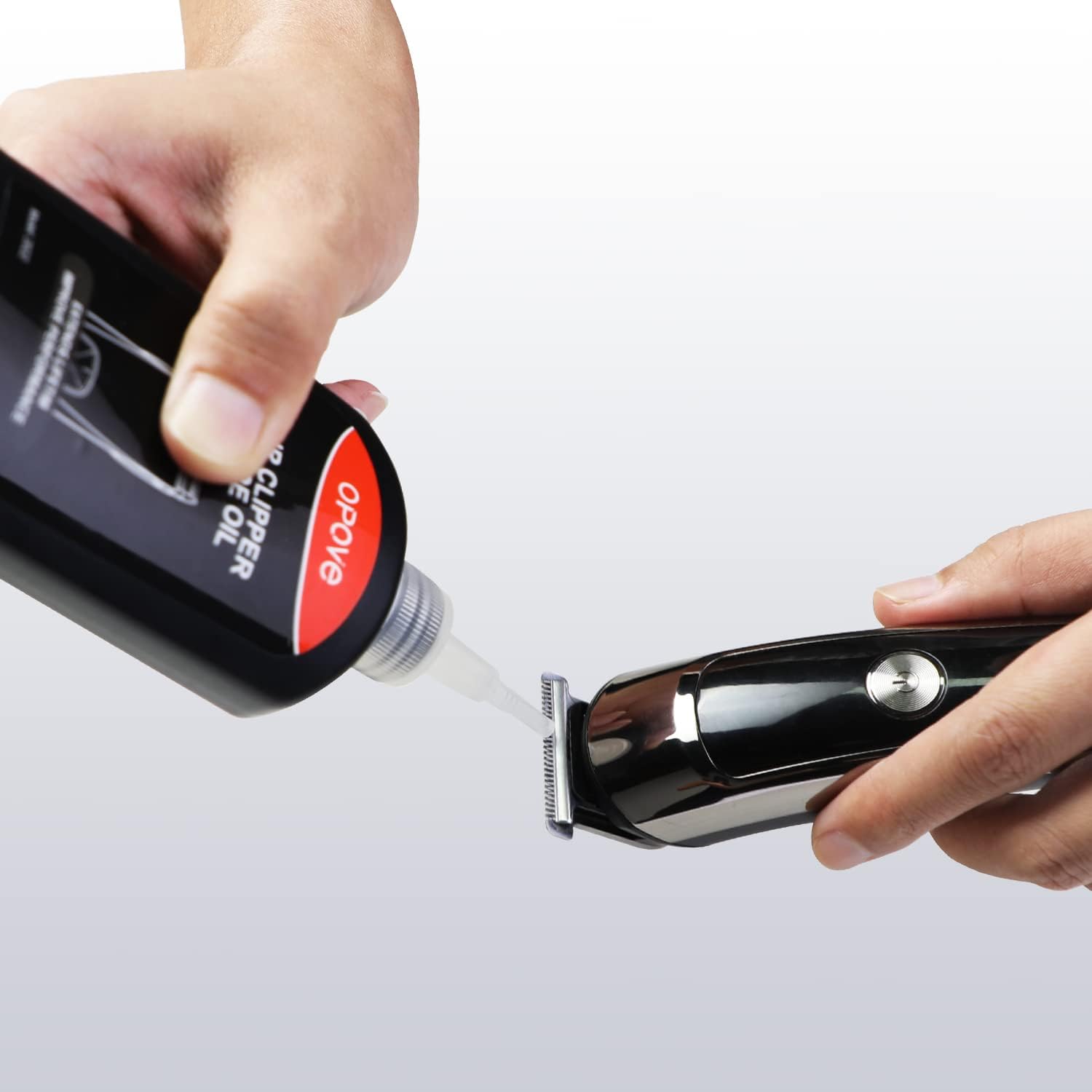 Opove oil drops demonstrated for maintaining blade lubrication.
