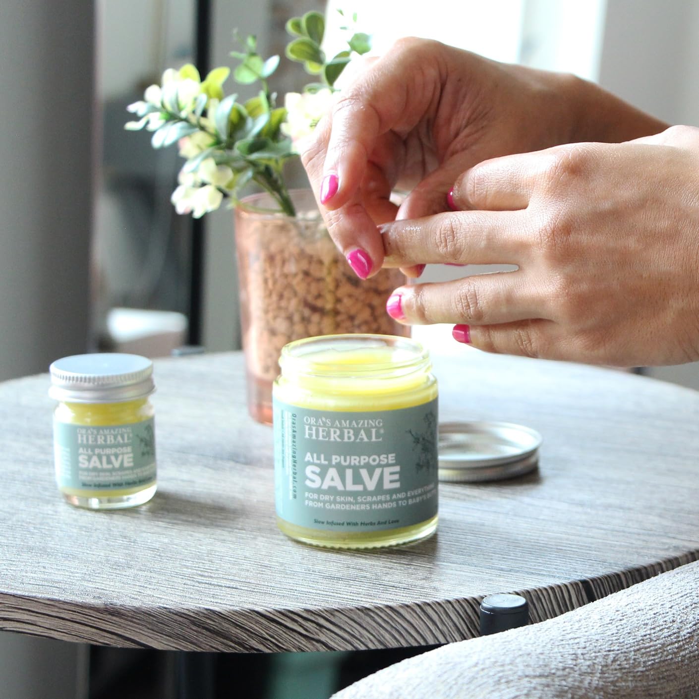 Ora's Amazing Herbal 1oz travel jar for on-the-go care.