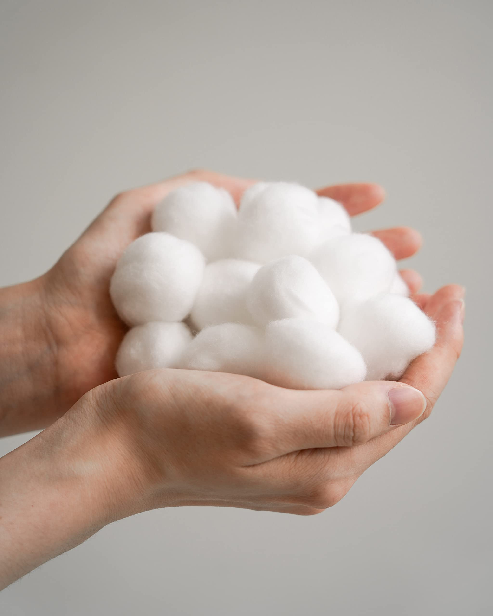 Organyc soft-texture cotton balls for gentle makeup removal and baby care.