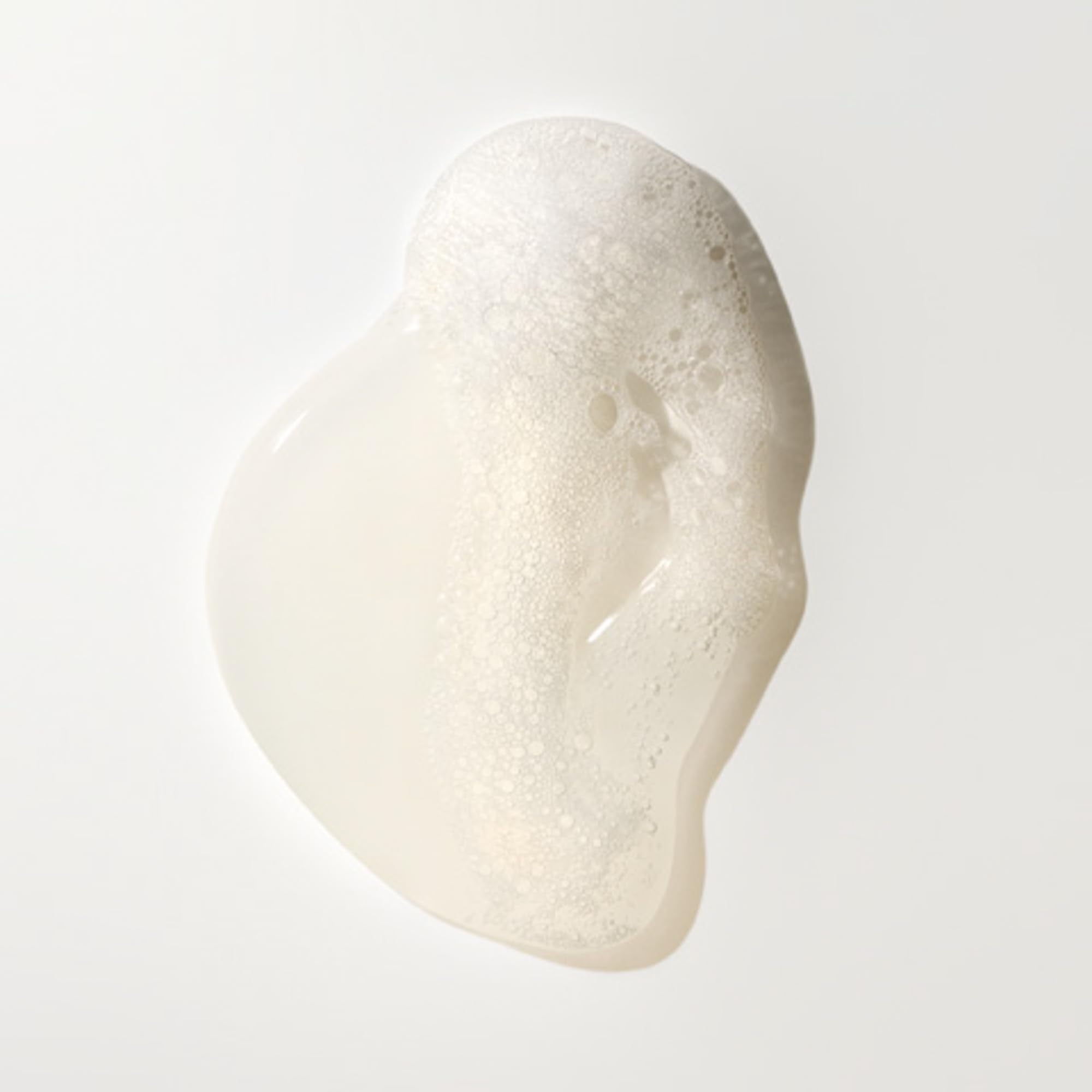 Oribe Alchemy Resilience Champú, mejora la elasticidad y resistencia de cada hebra.