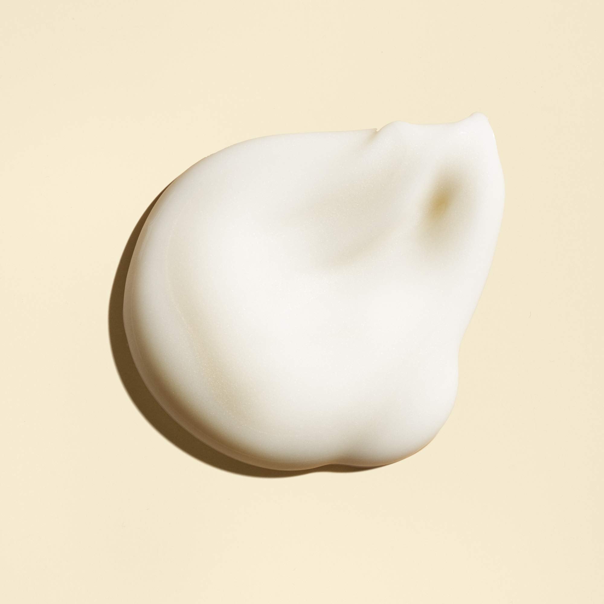 Easier styling and manageability with Oribe Balm D'Or on damp hair.