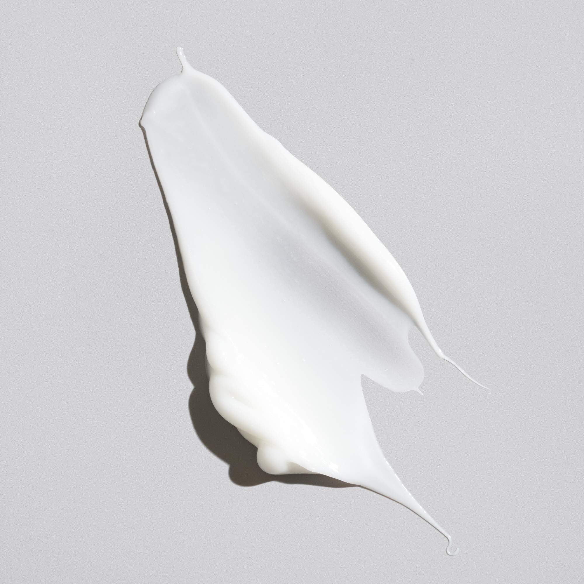 Oribe Crème for Style packaging detail emphasizes premium design.
