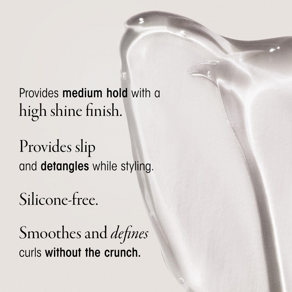 Oribe Curl Gelée application spreads through hands for detangling