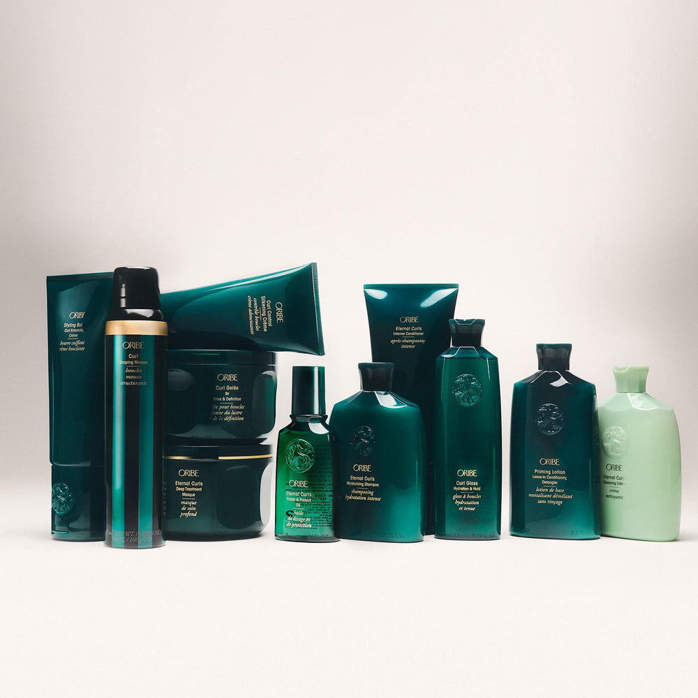 Oribe Curl Shaping Mousse packaging is travel-friendly 5.7 oz.