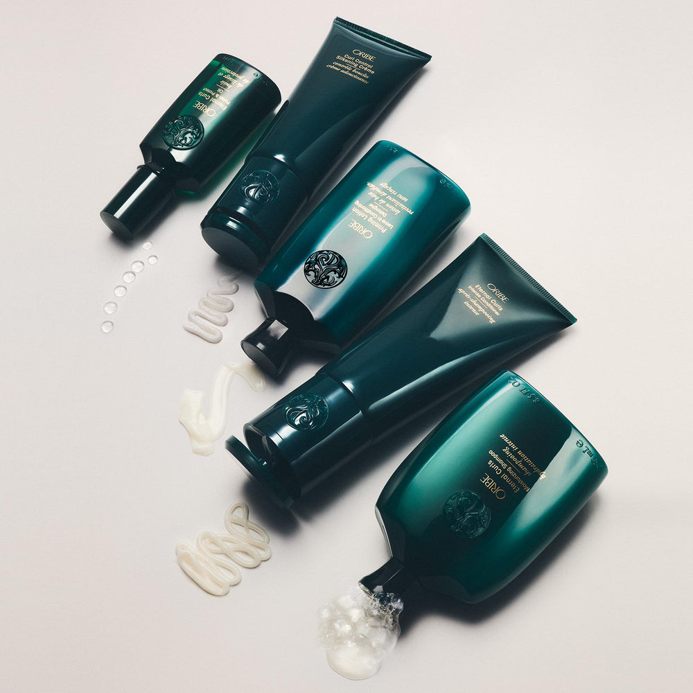 Oribe Eternal Curls Polish & Protect Oil bottle cap for easy use.