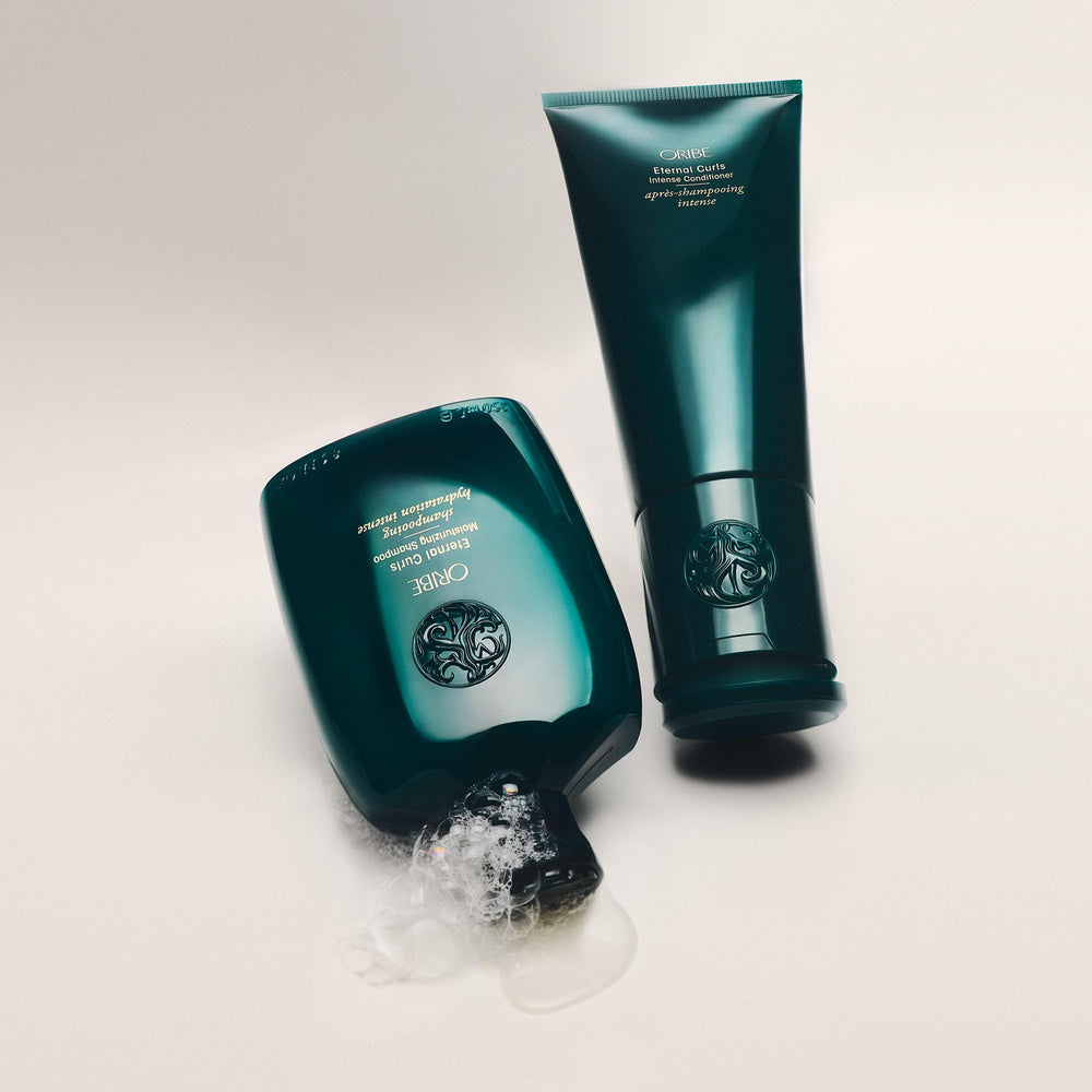 Oribe Eternal Curls Shampoo in use on wet hair for hydration