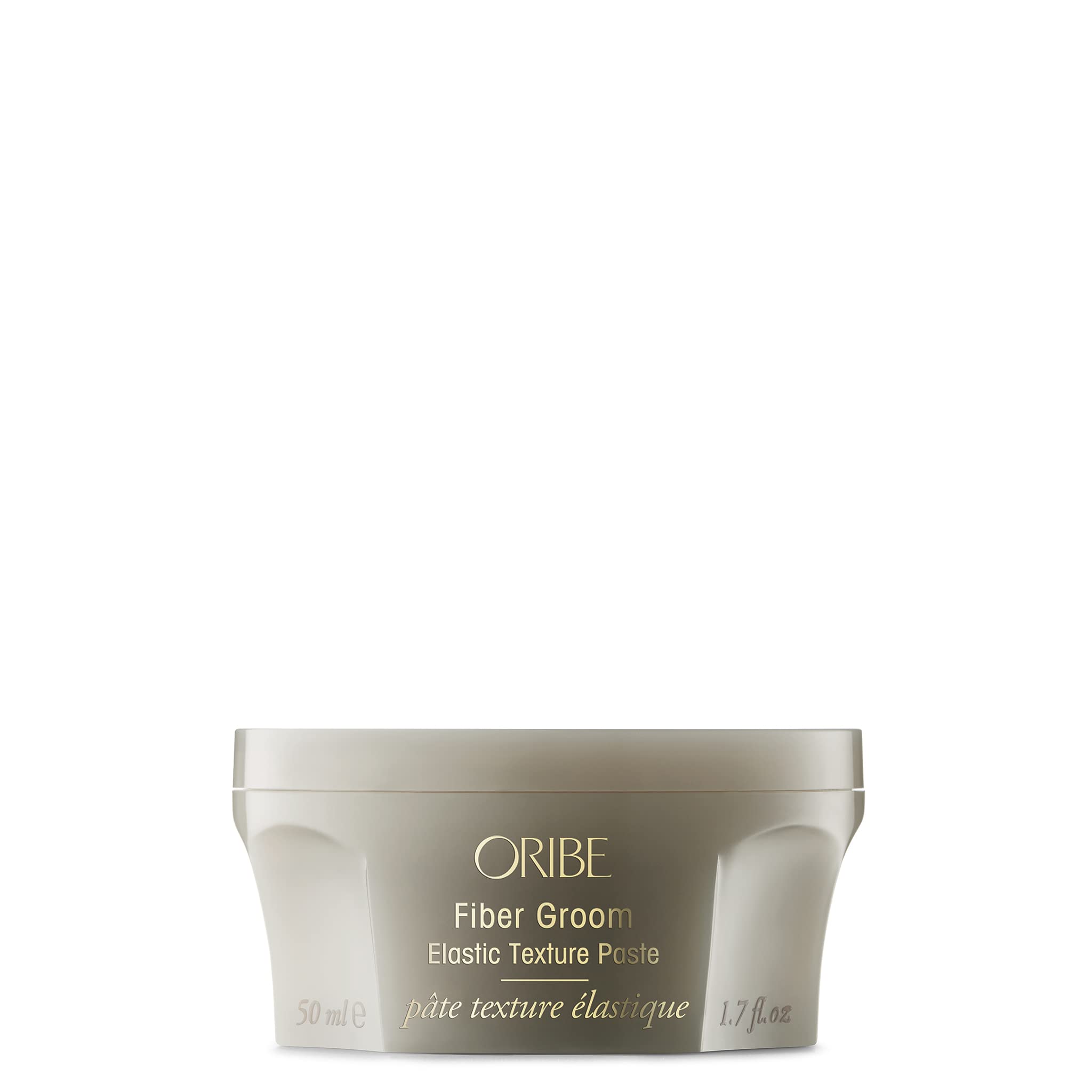 Oribe Fiber Groom elastic texture paste tube offering flexible hold with subtle shine