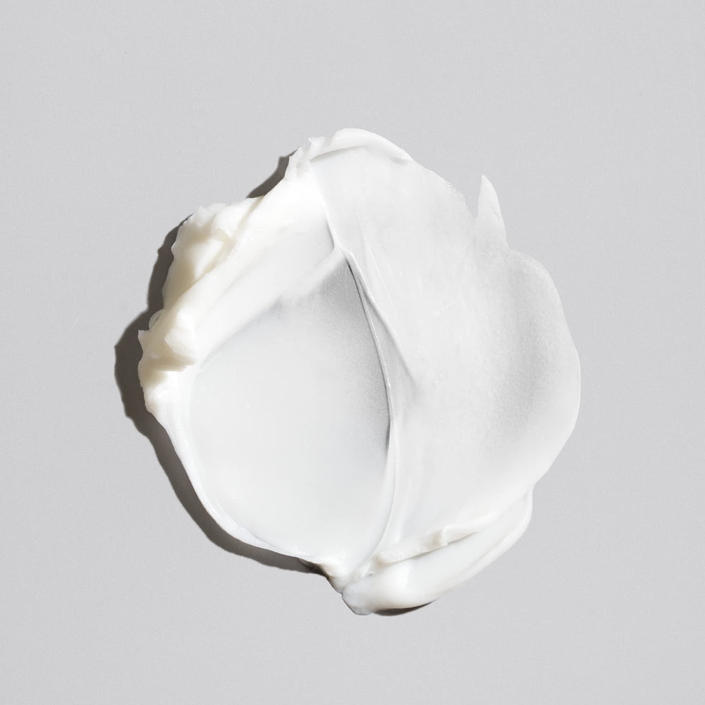 Oribe Fiber Groom product image showing smooth finish and conditioning feel