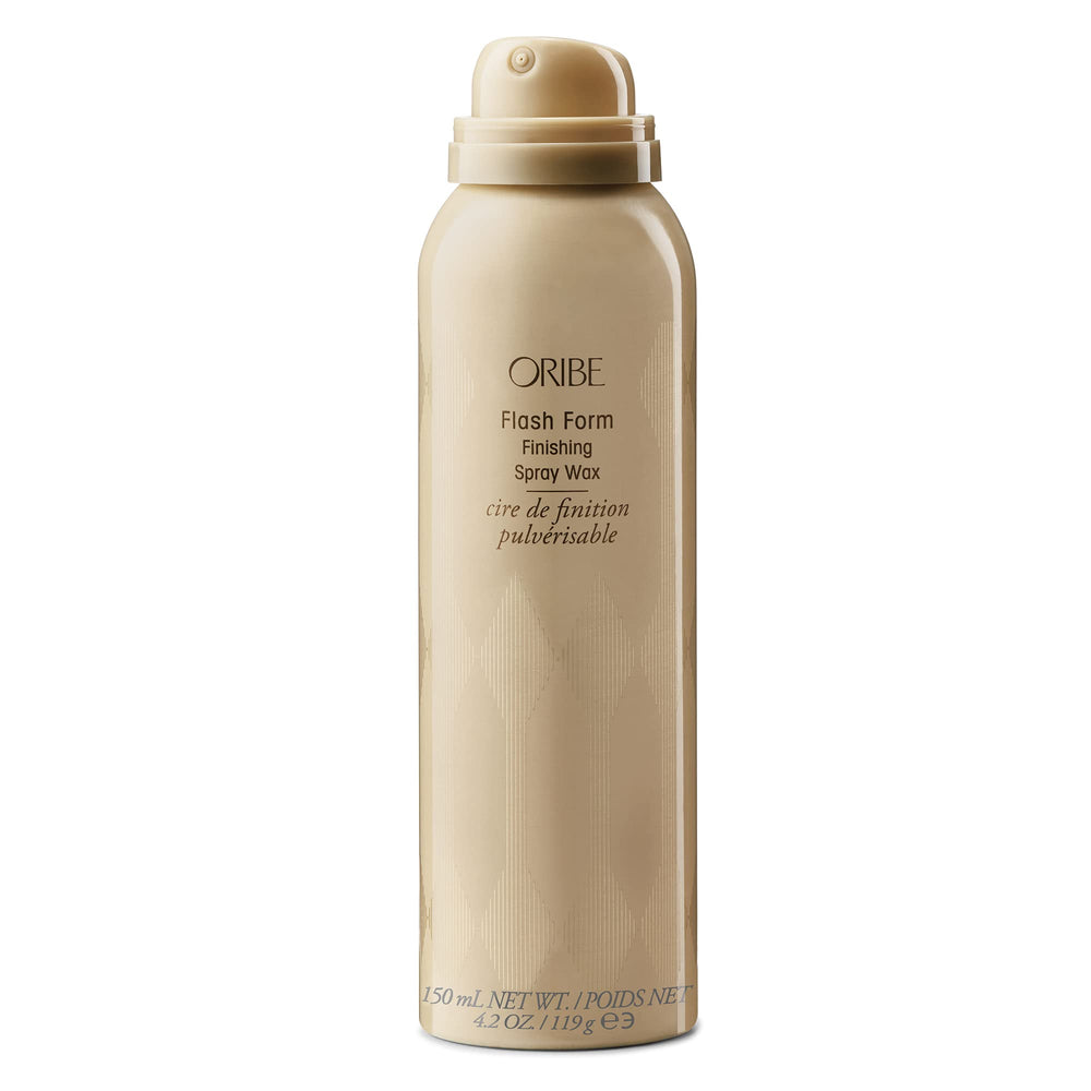 Applying Oribe Flash Form Finishing Spray Wax to hair sections for texture