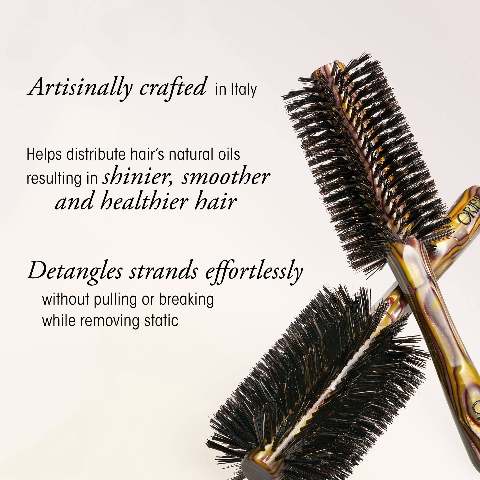 Oribe Flat Brush close-up reveals custom Italian resin material.