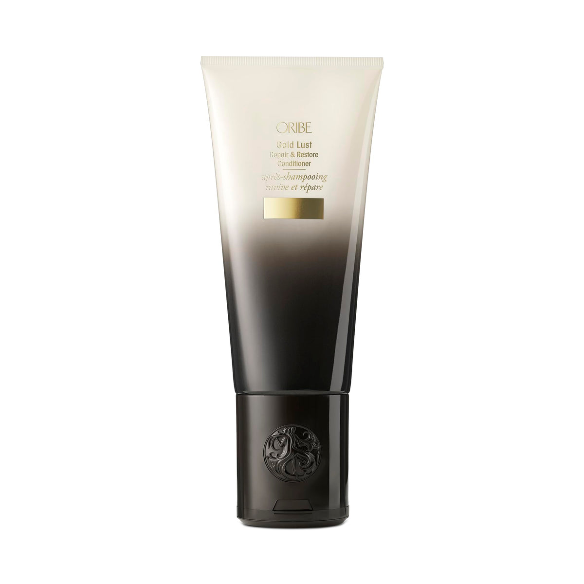 Oribe Gold Lust Repair & Restore Conditioner bottle promotes revived, glossy hair.