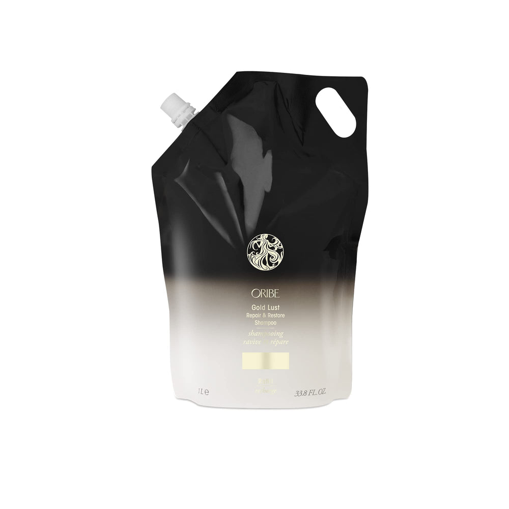 Oribe Gold Lust shampoo bottle shown for luxury cleansing and moisture on dry hair