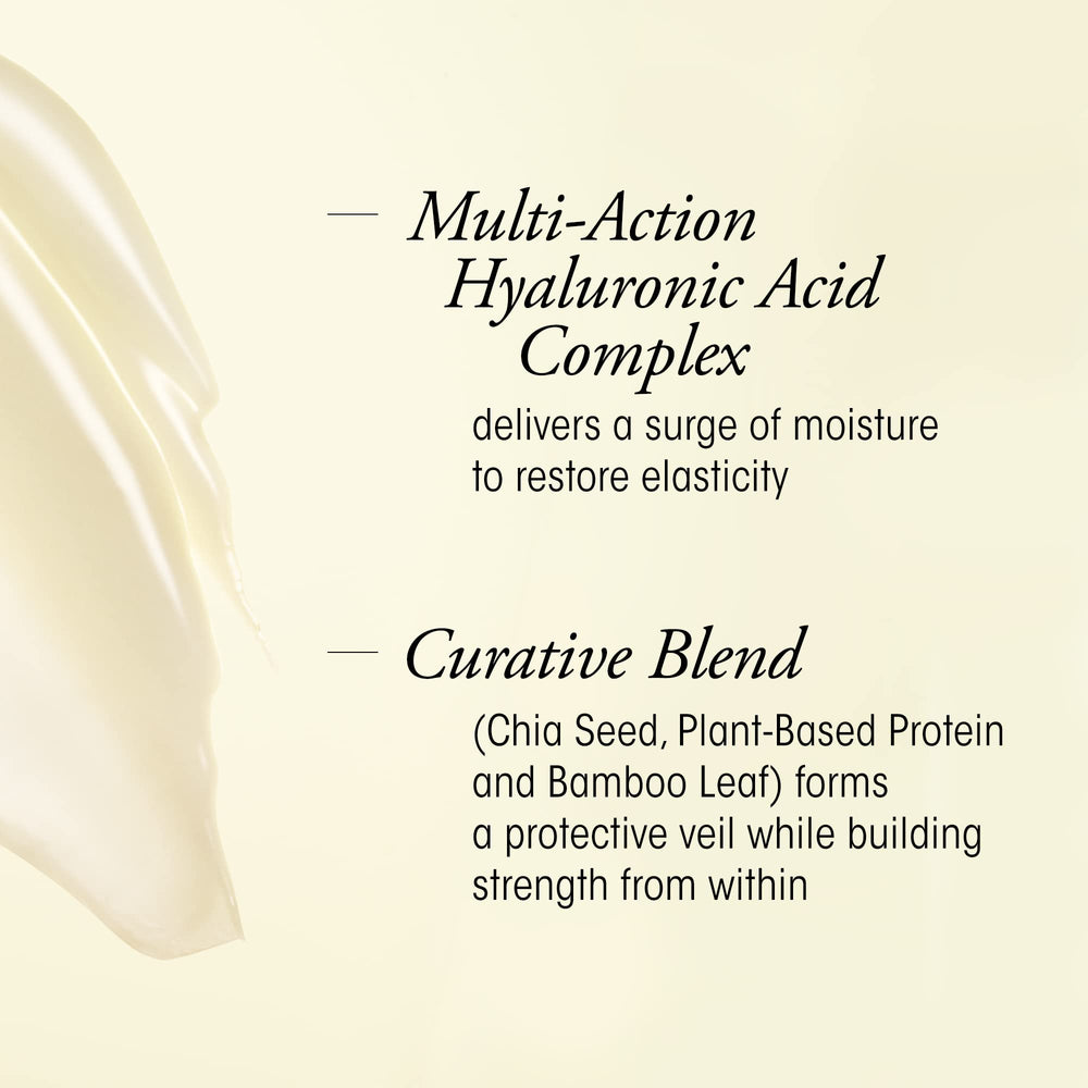Oribe Hair Alchemy Conditioner bottle front emphasizes conditioning power for flexible, glossy strands.