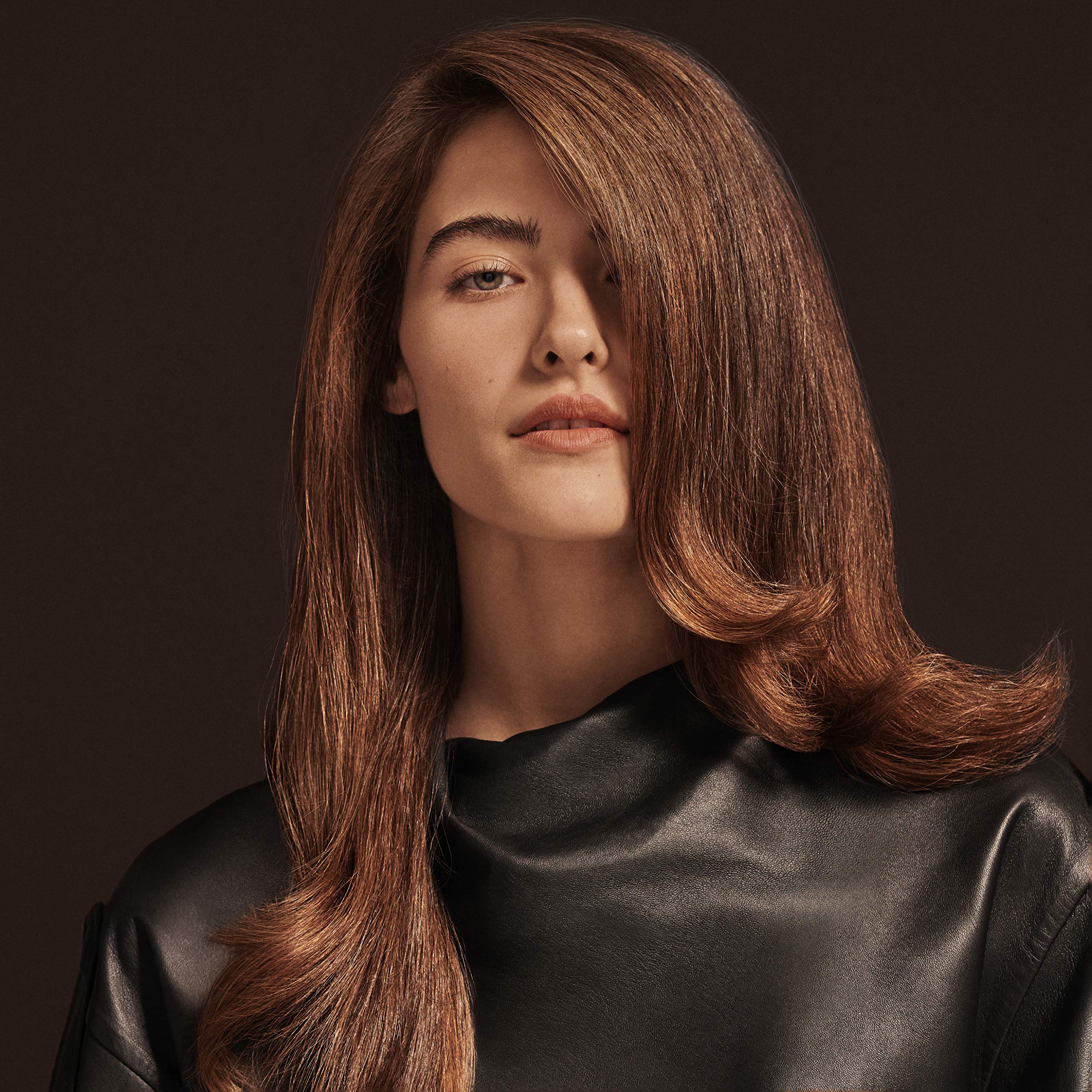 Vegan and cruelty-free icon beside Oribe Imperial Blowout packaging