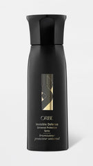 Oribe Invisible Defense spray in action with even distribution and daily protection