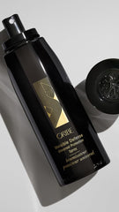 Oribe Invisible Defense UV shield angle shot ensuring surface protection
