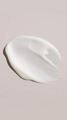 Oribe Magnificent Volume cream texture close-up for light conditioning