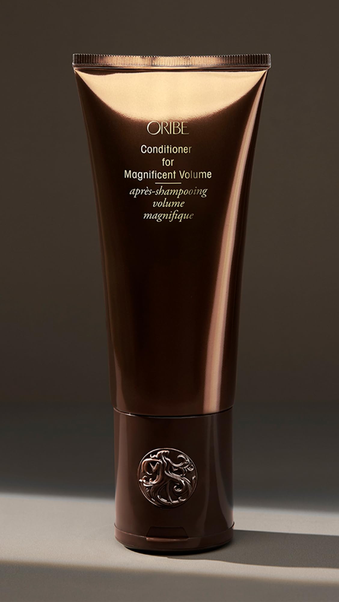 Oribe Magnificent Volume model with soft, manageable tresses post-application