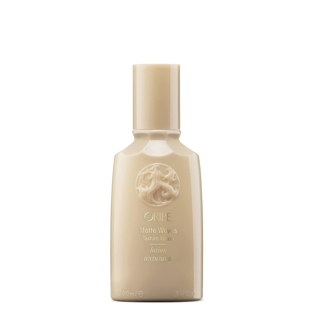 Oribe Matte Waves Texture Lotion bottle demonstrates matte texture for beachy style